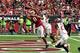 GLENDALE, AZ - SEPTEMBER 18: Wide receiver Larry Fitzgerald #11 of the Arizona Cardinals makes a catch for a touchdown over cornerback Brent Grimes #24 of the Tampa Bay Buccaneers during the second quarter of the NFL game at University of Phoenix Stadium