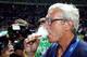 Berlin, GERMANY: Head coach of the Italian team Marcello Lippi smokes a cigar as he celebrates Italy?s victory over France in the 2006 World Cup final football match at Berlin?s Olympic Stadium, 09 July 2006. Italy won 5-3 on penalties. AFP PHOTO/ ODD