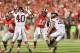 COLUMBUS, OH - SEPTEMBER 6: Quarterback J.T. Barrett #16 of the Ohio State Buckeyes passes against the Virginia Tech Hokies at Ohio Stadium on September 6, 2014 in Columbus, Ohio. (Photo by Jamie Sabau/Getty Images)