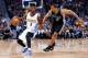 Apr 8, 2016; Denver, CO, USA; San Antonio Spurs guard Andre Miller (24) guards Denver Nuggets guard Emmanuel Mudiay (0) in the fourth quarter at the Pepsi Center. The Nuggets defeated the Spurs 102-98. Mandatory Credit: Isaiah J. Downing-USA TODAY Sports