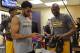 LOS ANGELES, CA - APRIL 13: Kobe Bryant #24 of the Los Angeles Lakers signs a shoes for D'Angelo Russell #1 before the game against the Utah Jazz at STAPLES Center on April 13, 2016 in Los Angeles, California. NOTE TO USER: User expressly acknowledges an