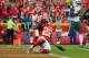 KANSAS CITY, MO - SEPTEMBER 25: Cornerback Marcus Peters #22 of the Kansas City Chiefs slides down in the end zone after intercepting his second pass against the New York Jets at Arrowhead Stadium during the fourth quarter of the game on September 25, 20