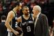 PORTLAND, OR - MAY 10: Gregg Popovich of the San Antonio Spurs speaks with Manu Ginobili #20 and Tony Parker #9 of the San Antonio Spurs in the second half of Game Three of the Western Conference Semifinals against the Portland Trail Blazers during the 20