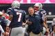 FOXBORO, MA - SEPTEMBER 18: Head coach Bill Belichick of the New England Patriots high fives Jacoby Brissett #7 during the second half against the Miami Dolphins at Gillette Stadium on September 18, 2016 in Foxboro, Massachusetts. (Photo by Jim Rogash/G