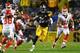 PITTSBURGH, PA - OCTOBER 02: Le'Veon Bell #26 of the Pittsburgh Steelers rushes against the Kansas City Chiefs in the second half during the game at Heinz Field on October 2, 2016 in Pittsburgh, Pennsylvania. (Photo by Joe Sargent/Getty Images)