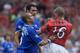 Roy Keane in typically combative action for United against Chelsea.
