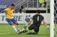 Brazil's Gabriel Jesus kicks to score against Bolivia's goalkeeper Carlos Lampe during their Russia 2018 World Cup qualifier football match in Natal, Brazil, on October 6, 2016. / AFP / Nelson ALMEIDA (Photo credit should read NELSON ALMEIDA/AFP/Ge