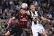 Juventus' defender from Switzerland Stephan Lichtsteiner (R) vies with AC Milan's defender from Italy Mattia De Sciglio during the Italian Tim Cup final football match AC Milan vs Juventus on May 21, 2016 at the Olympic Stadium in Rome. AFP PHOTO / TIZ