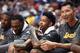 ANAHEIM, CA - OCTOBER 04: Brandon Ingram #14 and Yi Jianlian #11 of the Los Angeles Lakers laugh on the bench during a preseason game against the Sacramento Kings at Honda Center on October 4, 2016 in Anaheim, California. NOTE TO USER: User expressly ac