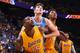 Ontario, CA - OCTOBER 9: Thomas Robinson #15 and Nick Young #0 of the Los Angeles Lakers box out Juancho Hernangomez #41 of the Denver Nuggets during a preseason game on October 9, 2016 at Citizens Business Bank Arena in Ontario, California. NOTE TO USER