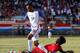 HAVANA, CUBA - OCTOBER 07: Daniel Ernesto Luis Saez #6 of Cuba attempts to tackle Julian Green #19 of the United States at Estadio Pedro Marrero on October 7, 2016 in Havana, Cuba. (Photo by Kevin C. Cox/Getty Images)