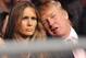 ANAHEIM, CA - JANUARY 24: Donald Trump (R) and wife Melania Trump attend front row at 'Affliction M-1 Global Day of Reckoning' at the Honda Center on January 24, 2009 in Anaheim, California. (Photo by Jon Kopaloff/Getty Images)