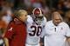 Alabama head trainer Jeff Allen, left, came up with the idea of a having a medical tent on the Alabama sideline.