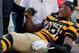 Seeing a player get looked at on a sideline trainer's table may soon be a thing of the past in football.