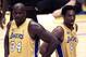 LOS ANGELES, CA - JUNE 6: Los Angeles Lakers' Shaquille O'Neal (R) and Kobe Bryant stand next to each other during the first quarter of NBA Finals, Game 1 against the Philadelphia 76ers at the Staples Center, Los Angeles, 06 June 2001. AFP PHOTO / VINCE
