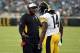 JACKSONVILLE, FL - AUGUST 14: Head coach Mike Tomlin of the Pittsburgh Steelers speaks with Sammie Coates #14 during a preseason game against the Jacksonville Jaguars at EverBank Field on August 14, 2015 in Jacksonville, Florida. (Photo by Stacy Revere/