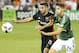 Aug 13, 2016; Washington, DC, USA; D.C. United defender Steve Birnbaum (15) battles Portland Timbers forward Lucas Melano (26) for the ball during the first half at Robert F. Kennedy Memorial. Mandatory Credit: Brad Mills-USA TODAY Sports