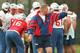 NEW ORLEANS, UNITED STATES: New England Patriots head coach Bill Parcells (C) directs his team's practice 24 January at their practice facility at Tulane University in New Orleans. The Patriots will play the Green Bay Packers 26 January in Super Bowl XXX