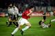 Keane celebrates his most iconic goal.
