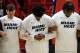 MIAMI, FL - OCTOBER 11: The Miami Heat stand arm in arm during the national anthem during a preseason game against the Brooklyn Nets at American Airlines Arena on October 11, 2016 in Miami, Florida. NOTE TO USER: User expressly acknowledges and agrees th