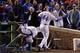 CHICAGO, IL - OCTOBER 30: Anthony Rizzo #44 of the Chicago Cubs (R) catches a foul ball next to David Ross #3 in the second inning against the Cleveland Indians in Game Five of the 2016 World Series at Wrigley Field on October 30, 2016 in Chicago, Illino