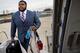 Ravens defensive tackle Brandon Williams boards a team flight to Pittsburgh.