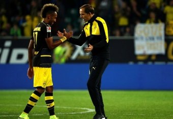 Dortmund's head coach Thomas Tuchel (R) and Dortmund's Gabonese forward Pierre-Emerick Aubameyang celebrate after the German first division Bundesliga football match between VfL Wolfsburg and Borussia Dortmund at Volkswagen Arena in Wolfsburg, central Ger