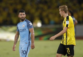 SHENZHEN, CHINA - JULY 28:  Sergio Aguero of Manchester City talk with Jacob Bruun Larsen of Borussia Dortmund during the 2016 International Champions Cup match between Manchester City and Borussia Dortmund at Shenzhen Universiade Stadium on July 28, 2016