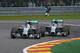 Nico Rosberg (right) clips Lewis Hamilton at the 2014 Belgian Grand Prix.
