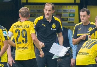 Dortmund, Germany 27.07.2016, 1.Bundesliga 1. Spieltag, BV Borussia Dortmund - 1. FSV Mainz 05, 2:1, Marcel Schmelzer (BVB)  und Trainer Thomas Tuchel (BVB)   (Photo by TF-Images/Getty Images)