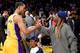 LOS ANGELES, CA - NOVEMBER 15: Rapper Lil Wayne shakes hands with Jordan Clarkson #6 of the Los Angeles Lakers during a during a 125-118 Laker win over the Brooklyn Nets at Staples Center on November 15, 2016 in Los Angeles, California. NOTE TO USER: Us