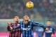 AC Milan's Ghanaian forward Kevin-Prince Boateng (L) vies for the ball with Inter Milan's Brazilian defender Joao Miranda during the Serie A football match between AC Milan and Inter Milan at San Siro Stadium in Milan on January 31, 2015. / AFP / GIUSEPP