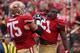 SAN FRANCISCO, CA - OCTOBER 06: Frank Gore #21 of the San Francisco 49ers celebrates with Alex Boone #75 after scoring a touchdown in the first quarter against the Houston Texans at Candlestick Park on October 6, 2013 in San Francisco, California. The 49