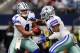 ARLINGTON, TX - NOVEMBER 20: Dak Prescott #4 hands off to Ezekiel Elliott #21 of the Dallas Cowboys during the second half against the Baltimore Ravens at AT&T Stadium on November 20, 2016 in Arlington, Texas. (Photo by Tom Pennington/Getty Images)