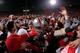 COLUMBUS, OH - NOVEMBER 18: Andrew Moses #66 of the Ohio State Buckeyes celebrates with fans and players on the field after Ohio State's 42-39 win against the Michigan Wolverines November 18, 2006 at Ohio Stadium in Columbus, Ohio. (Photo by Gregory Sha