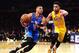 LOS ANGELES, CA - DECEMBER 23: Russell Westbrook #0 of the Oklahoma City Thunder drives past D'Angelo Russell #1 of the Los Angeles Lakers during the first half at Staples Center on December 23, 2015 in Los Angeles, California. NOTE TO USER: User expres