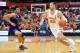SYRACUSE, NY - NOVEMBER 15: Tyler Lydon #20 of the Syracuse Orange drives to the basket around Malachi Alexander #21 of the Holy Cross Crusaders during the second half at the Carrier Dome on November 15, 2016 in Syracuse, New York. Syracuse defeated Holy