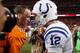 DENVER, CO - SEPTEMBER 07: Quarterback Peyton Manning #18 of the Denver Broncos and quarterback Andrew Luck #12 of the Indianapolis Colts meet at mid field after their game at Sports Authority Field at Mile High on September 7, 2014 in Denver, Colorado.