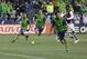SEATTLE, WA - NOVEMBER 22: Tyrone Mears #4, left, of the Seattle Sounders, Nelson Valdez #16, center, of the Seattle Sounders celebrate goal scored on a penalty kick by Nicolas Lodeiro #10, right, of the Seattle Sounders during the second half of a match