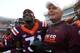 BLACKSBURG, VA - NOVEMBER 26: Head coach of the Virginia Tech Hokies Justin Fuente and cornerback Brandon Facyson #31 react following the victory against the Virginia Cavaliers at Lane Stadium on November 26, 2016 in Blacksburg, Virginia. Virginia Tech de