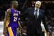 CHARLOTTE, NC - FEBRUARY 14: Head coach Phil Jackson talks to Kobe Bryant #24 of the Los Angeles Lakers during their game against the Charlotte Bobcats at Time Warner Cable Arena on February 14, 2011 in Charlotte, North Carolina. NOTE TO USER: User expre