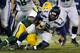 GREEN BAY, WI - DECEMBER 11: Datone Jones #95 of the Green Bay Packers sacks Russell Wilson #3 of the Seattle Seahawks in the third quarter at Lambeau Field on December 11, 2016 in Green Bay, Wisconsin. (Photo by Dylan Buell/Getty Images)