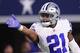 ARLINGTON, TX - DECEMBER 18: Ezekiel Elliott #21 of the Dallas Cowboys celebrates after rushing for a first down during the fourth quarter against the Tampa Bay Buccaneers at AT&T Stadium on December 18, 2016 in Arlington, Texas. (Photo by Tom Pennington