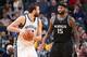 MEMPHIS, TN - DECEMBER 16: Marc Gasol #33 of the Memphis Grizzlies handles the ball against DeMarcus Cousins #15 of the Sacramento Kings during a game on December 16, 2016 at FedExForum in Memphis, Tennessee. NOTE TO USER: User expressly acknowledges and