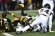 PITTSBURGH, PA - DECEMBER 25: Antonio Brown #84 of the Pittsburgh Steelers reaches for the end zone to score a 4 yard touchdown in the fourth quarter during the game against the Baltimore Ravens at Heinz Field on December 25, 2016 in Pittsburgh, Pennsylv