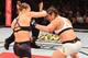 Rousey throws hard punches in the pocket.