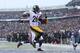 ORCHARD PARK, NY - DECEMBER 11: Le'Veon Bell #26 of the Pittsburgh Steelers runs for a touchdown against the Buffalo Bills during the second half at New Era Field on December 11, 2016 in Orchard Park, New York. (Photo by Tom Szczerbowski/Getty Images)