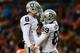 DENVER, CO - JANUARY 1: Wide receiver Amari Cooper #89 of the Oakland Raiders celebrates his touchdown with quarterback Connor Cook #8 in the third quarter of the game against the Denver Broncos at Sports Authority Field at Mile High on January 1, 2017 i