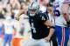 OAKLAND, CA - DECEMBER 04: Derek Carr #4 of the Oakland Raiders celebrates after a three-yard touchdown pass against the Buffalo Bills during their NFL game at Oakland Alameda Coliseum on December 4, 2016 in Oakland, California. (Photo by Brian Bahr/Get