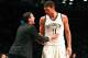 NEW YORK, NY - OCTOBER 31: Head coach Kenny Atkinson of the Brooklyn Nets talks with Brook Lopez #11 during the first half at Barclays Center on October 31, 2016 in New York City. NOTE TO USER: User expressly acknowledges and agrees that, by downloading